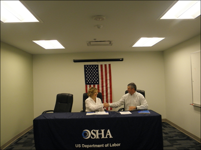 Dorinda Folse, Area Director, Baton Rouge Area Office, US DOL-OSHA and Steve Maslen, Senior Vice President, Clark McCarthy Healthcare Partners, Healthcare Administration, Joint Venture, after signing the Partnership agreement.