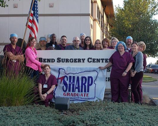 Bend Surgery Center staff celebrating its SHARP recognition