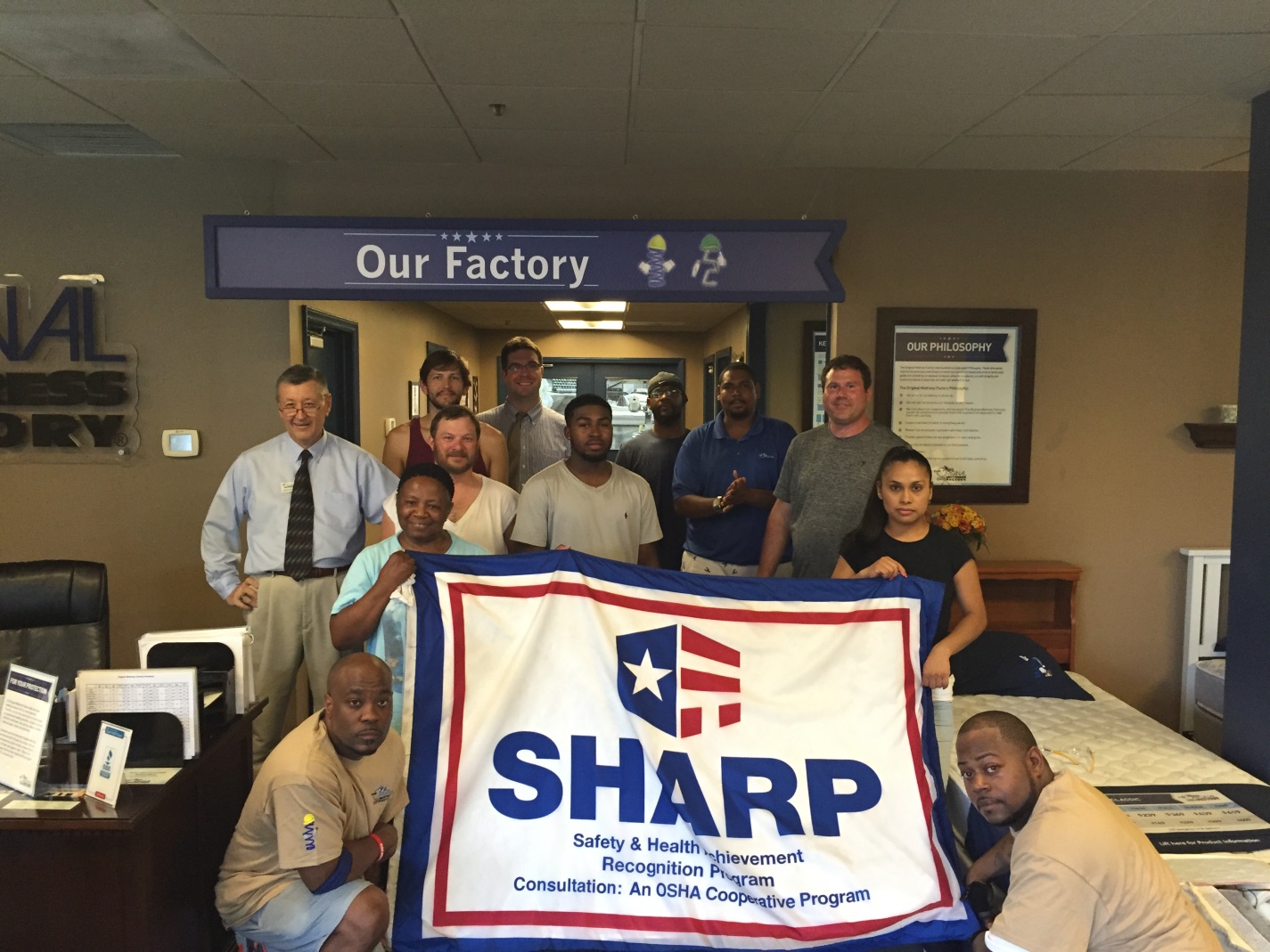 Left to Right: Scott Hudson, Eddie Carrington, Janice Woolard, Matthew Breedlove, Michael Neal, Reed Murphy, DaQuan Turner, Oliver Smith, Maurice Childressinco, Brett Rowe, Nadia Aguilar, Jayson Montague