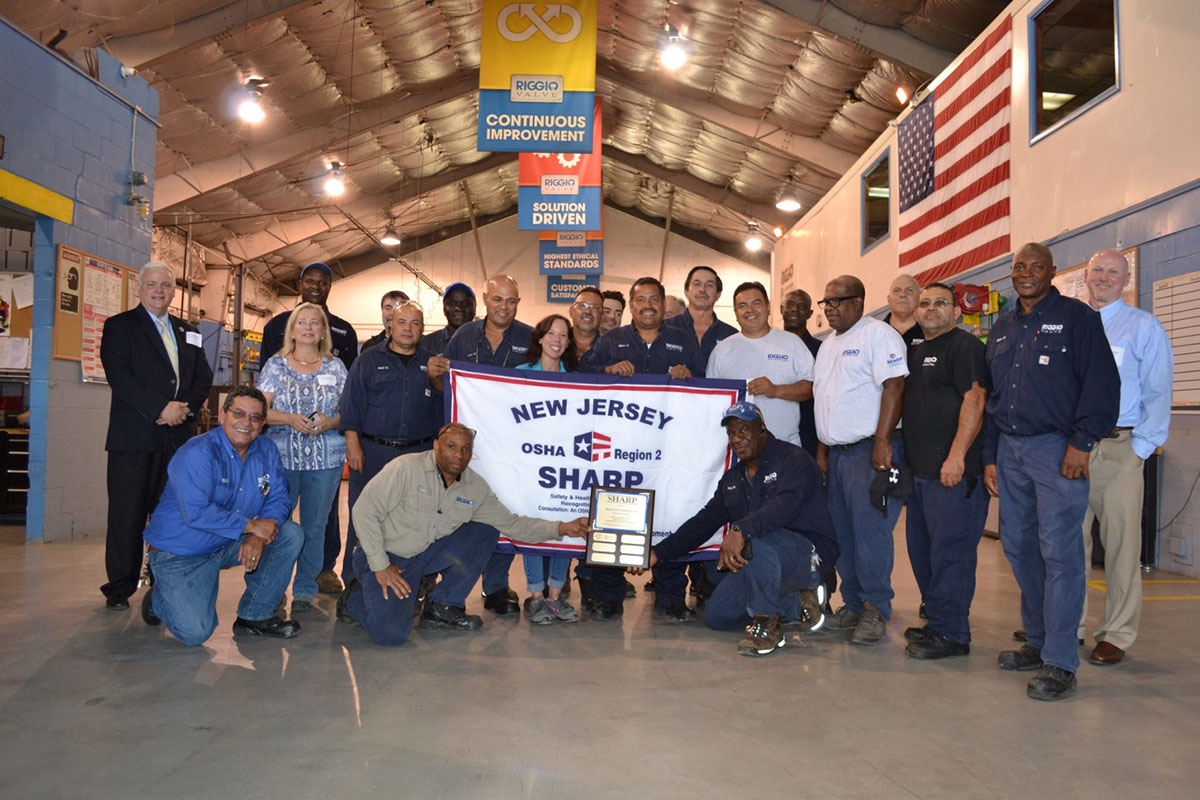 Frank D. Riggio Co Inc., Team Accepts OSHA SHARP Award and Flag