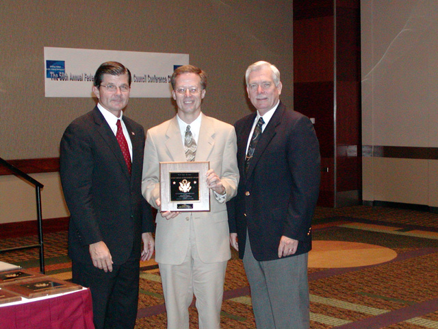 Minneapolis St. Paul FSHC 2003 Meritorious Award Winner, Alternate Tom Crable accepting.