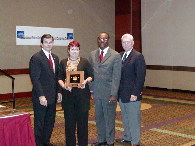 Puerto Rico FSHC 2003 Superior Award Winner, Chairperson Maria Maldonado and Vice Chairperson Victor Skerrett accepting.