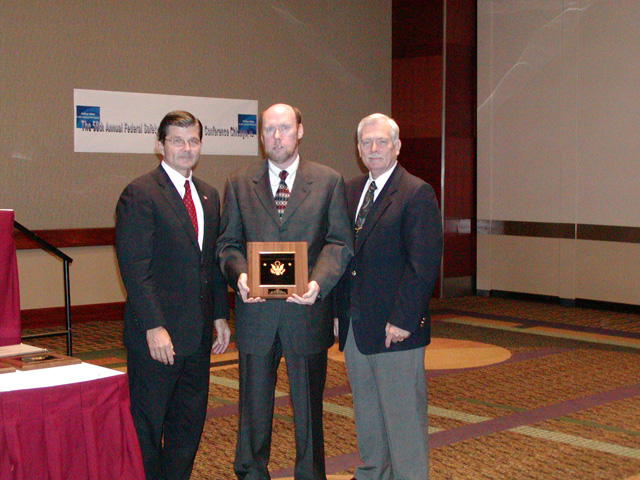 Central Ohio FSHC 2003 Meritorious Award Winner, Region V Federal Agency Program Officer Dennis McLaughlin accepting.