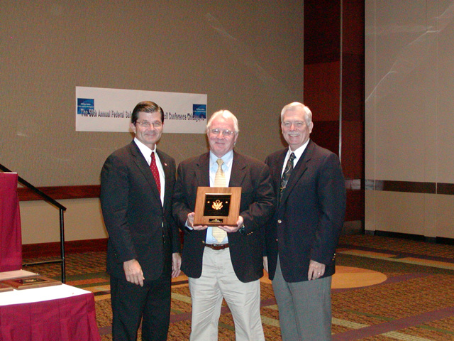 Region VIII 2003 Federal Safety and Health Council Award Winner, Acting Regional Administrator Greg Baxter accepting