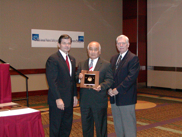 New Hampshire/Vermont FSHC 2003 Superior Award Winner, Federal Agency Program Officer Rudy Hermosa accepting.