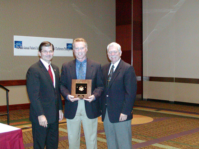 Region X 2003 Federal Safety and Health Council Award Winner, Regional Administrator Richard Terrill accepting.