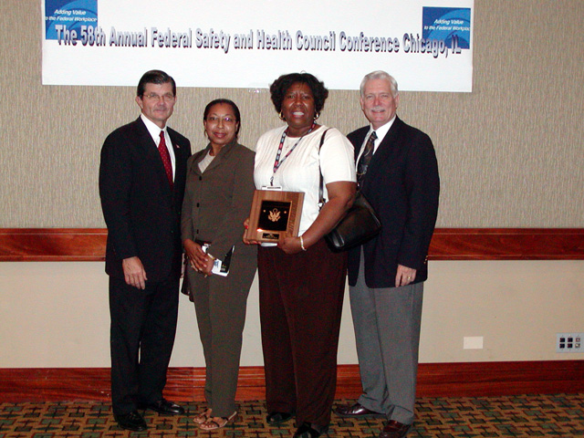 2003 FSHC Award Winner with Assistant Secretary John L. Henshaw, and Deputy Assistant Secretary R. Davis Layne