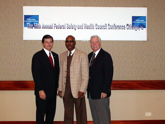 Metropolitan Washington Chairperson Curtis Wolridge with Assistant Secretary John L. Henshaw, and Deputy Assistant Secretary R. Davis Layne.