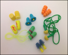 Photograph of various types and colors of earplugs. For problems with accessibility in using figures, illustrations in this document, please contact the Directorate of Technical Support and Emergency Management at (202) 693-2300.