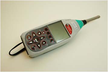 Photograph of a sound level meter. For problems with accessibility in using figures, illustrations in this document, please contact the Directorate of Technical Support and Emergency Management at (202) 693-2300.