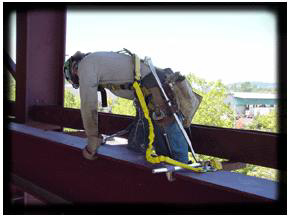Figure 3: Ironworker wearing personal fall arrest equipment