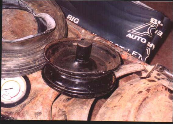 Picture depicting damage to tire and rim