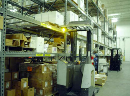 Forklift with overhead guard