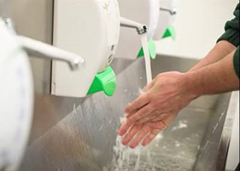 image of a worker demonstrating proper hand-washing