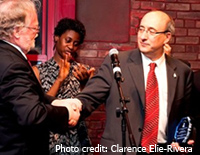 OSHA Assistant Secretary David Michaels receives the Clara Lemlich Public Service Award from Triangle Shirtwaist Factory Fire Memorial President James McCarthy.