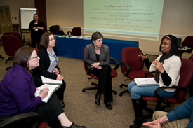Grantees from various organizations gather to discuss best practices for training.