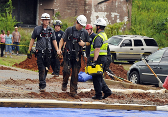 Rescue personnel conclude their search after finding the victim's body.